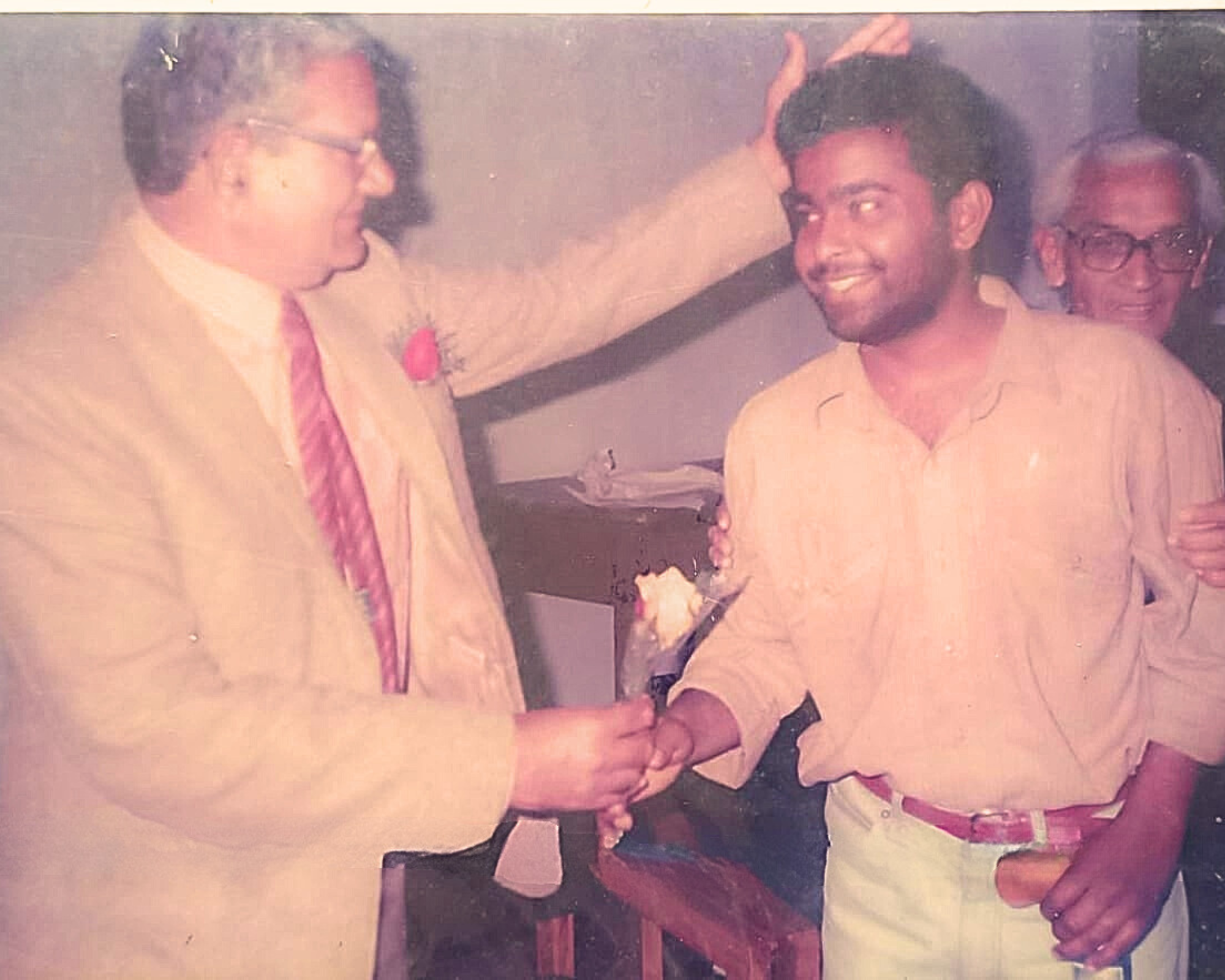 Multi talented Veivek Asthaana in his college days being felicitated by the Principal of Hansraj College